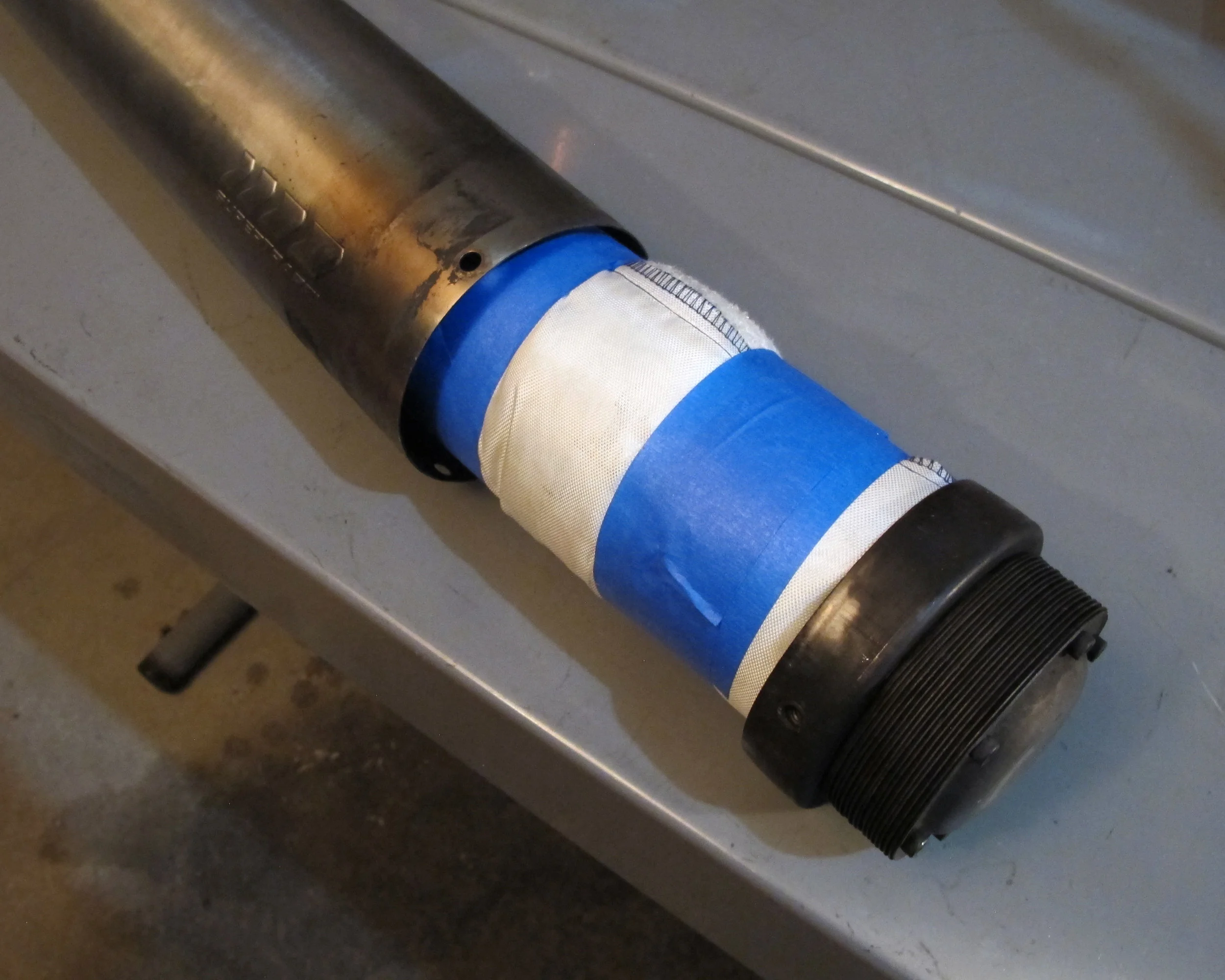 inserting new mufler.jpg