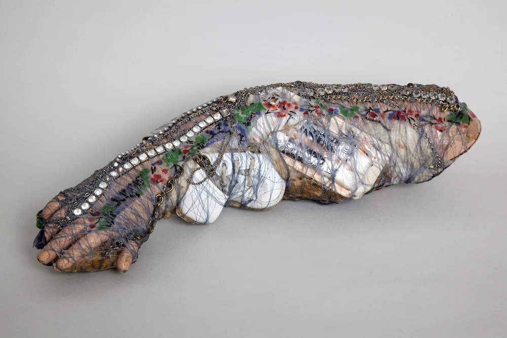 Mannequin Arm with Jewelry, Fabric and Dress Patterns, 2016, mixed media sculpture with encaustic, 3.75 x 14 x 3.75 inches