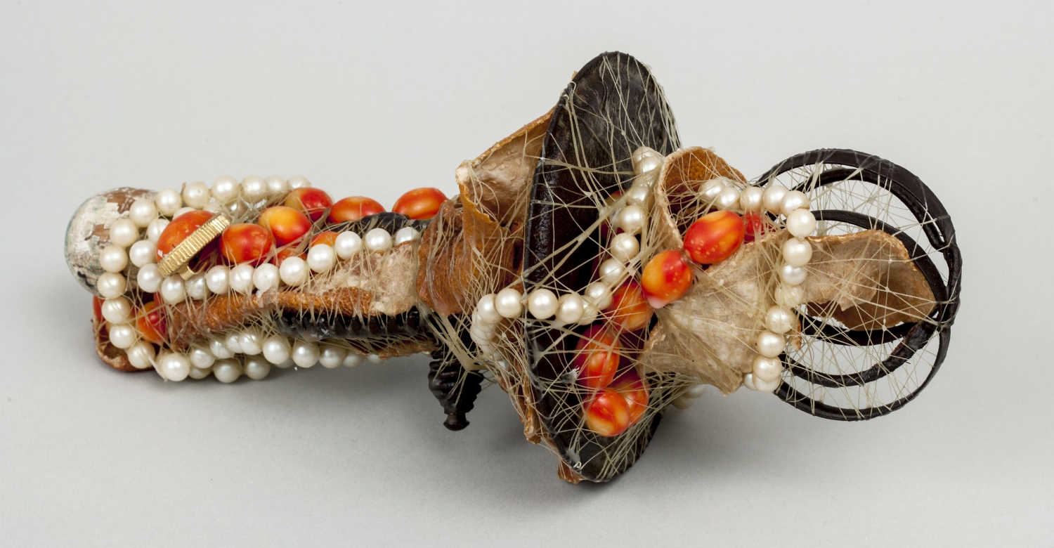 Rusted Eggbeater with Orange Peels and Pearls, 2016, mixed media sculpture with encaustic, 4.5 x 10 x 4.75 inches