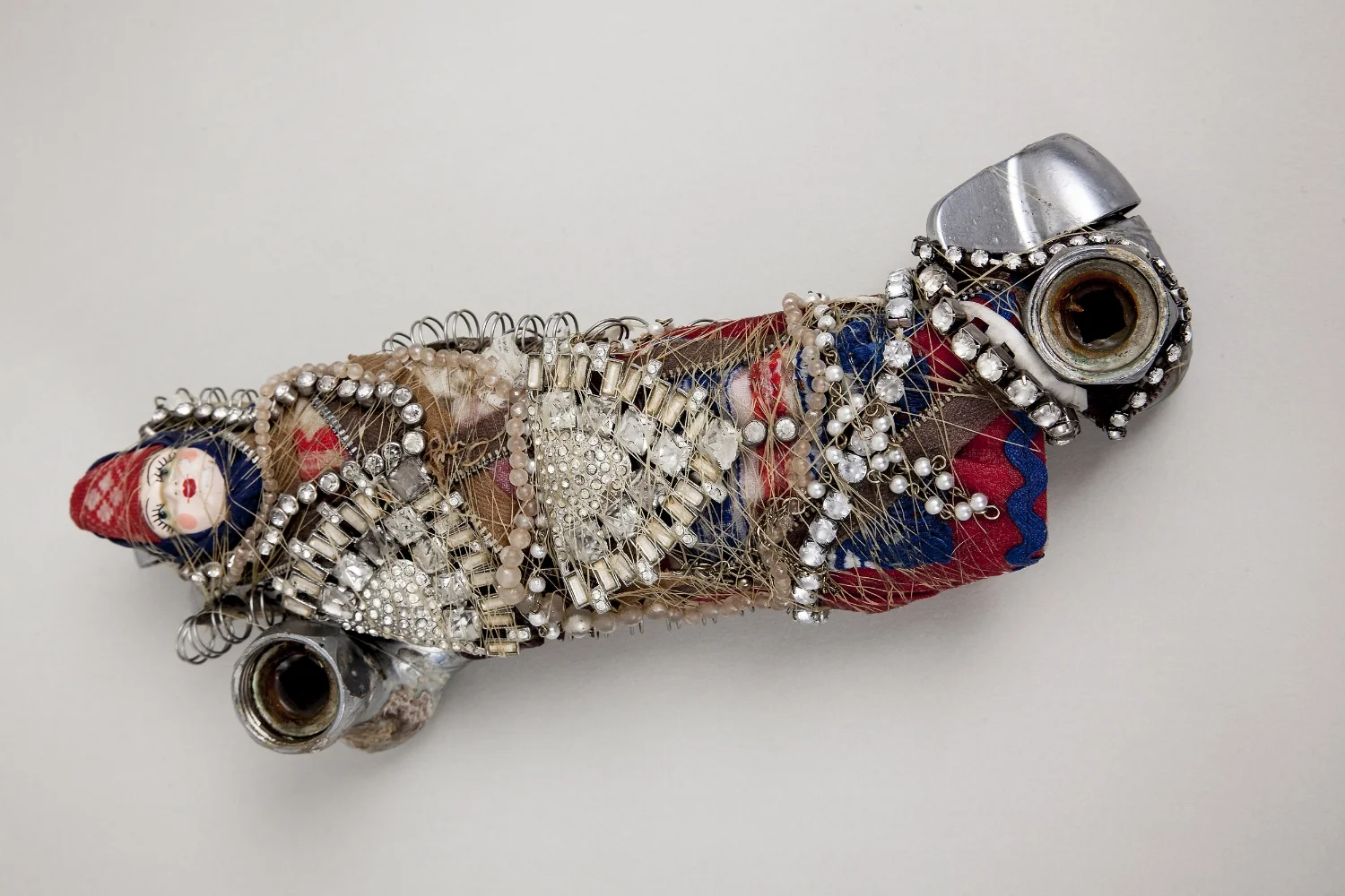 Kitchen Faucet with Russian Doll and Jewelry, 2016, mixed media sculpture with encaustic, 2.75 x 10.5 x 4 inches