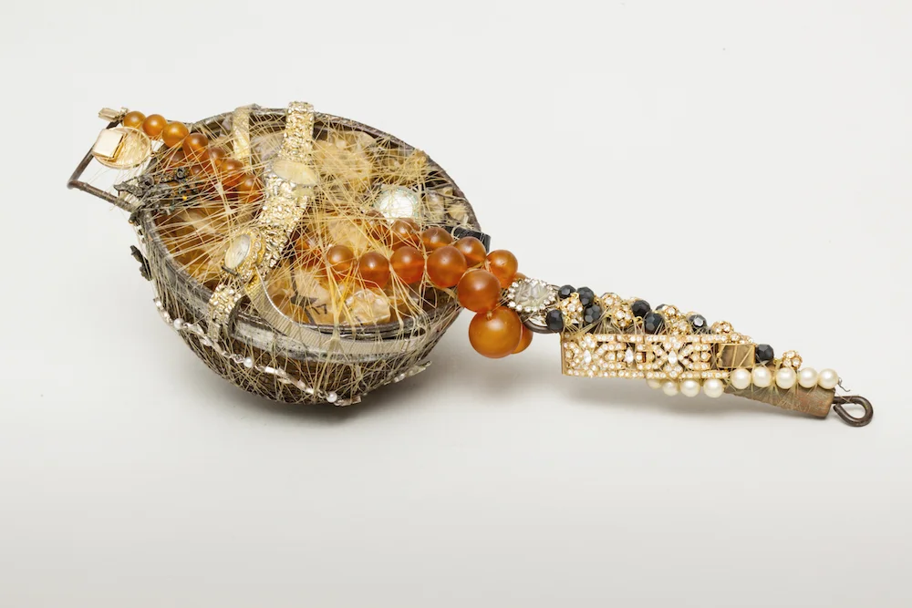 Catch of the Day, 2015, mixed media sculpture with encaustic, 3.75 x 12.5 x 5.5 inches