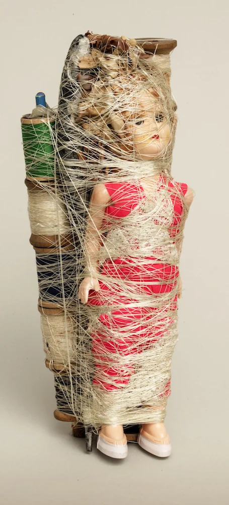 Doll with Thread and Needle Nose Pliers, 2014, mixed media sculpture, 8.25 x 3.25 x 2.5 inches