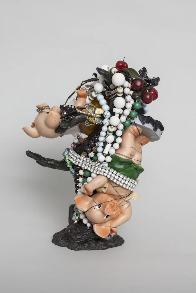 Happy Pigs on a Tree, 2014, mixed media sculpture with encaustic, 10.5 x 7.25 x 6 inches