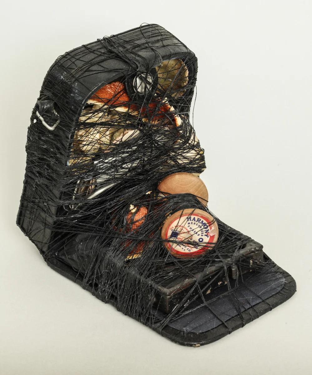 Small Case with Coin Purse, Spools and Orange Peels, 2014, mixed media sculpture with encaustic, 6 x 5 x 7 inches