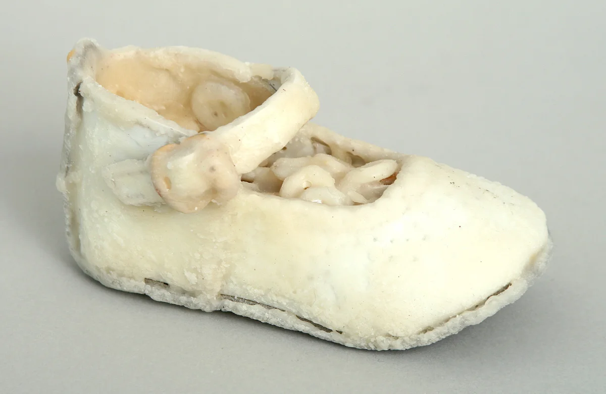 Cache, 2009, mixed media sculpture with encaustic, 2 x 4 x 2 inches