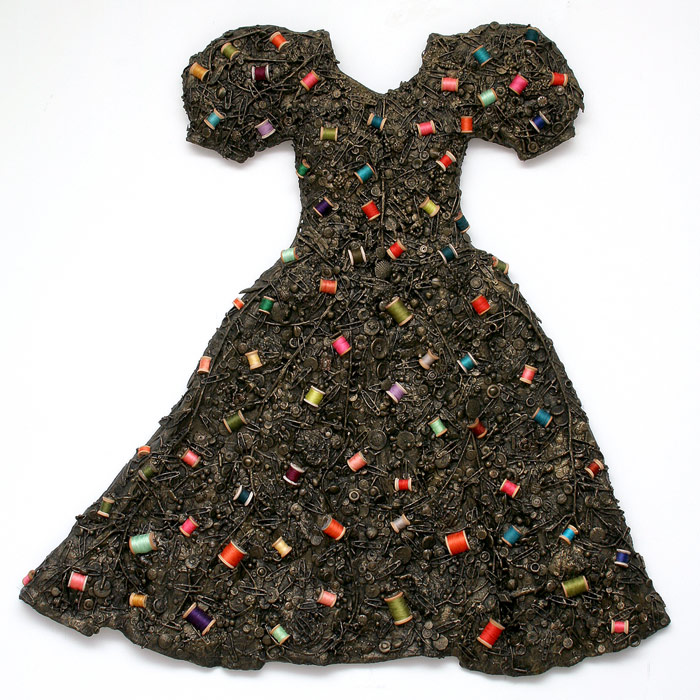 Trappings, 2005, mixed media relief, 47 x 46.5 x 2 inches