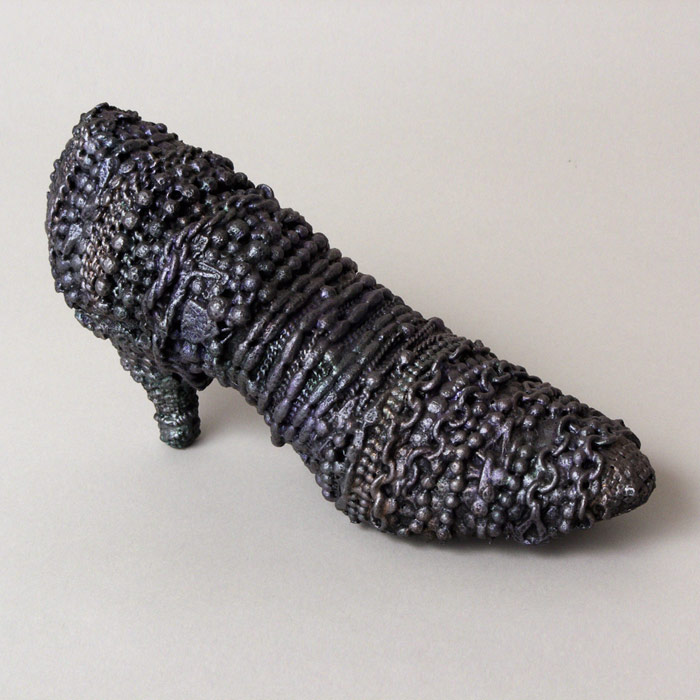 Bound, 2003, mixed media, 5.5 x 10 x 3.5 inches