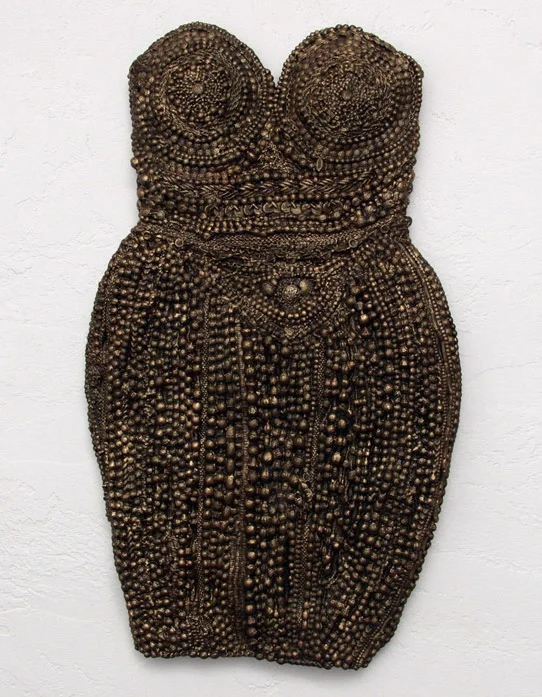 Cocktail Armor, 2003, mixed media relief, 37 x 21.5 x 3.5 inches