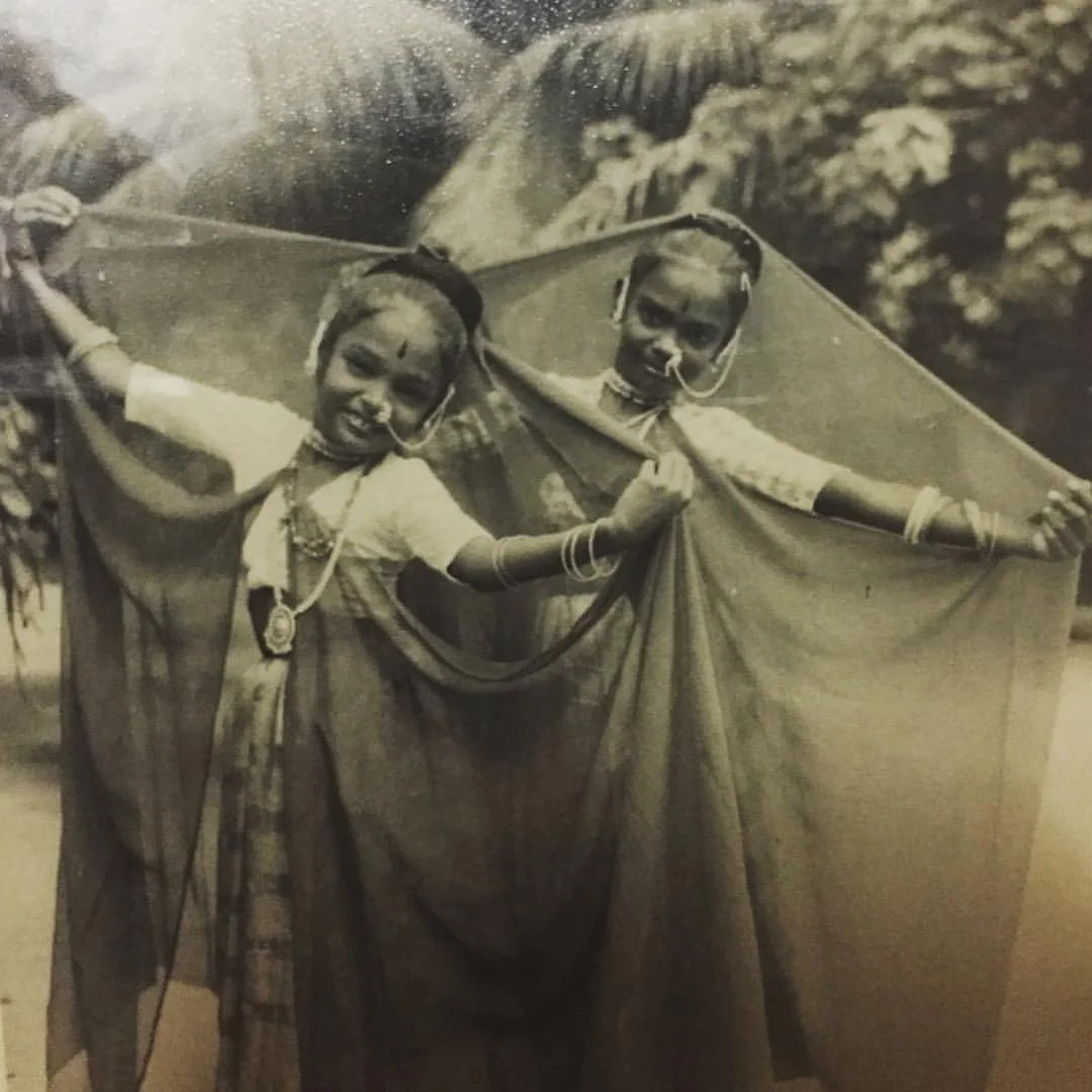 My Atha/mom in the back and my Chithi/aunt in front, as they perform Tamil Folk Dance in Chennai, India.