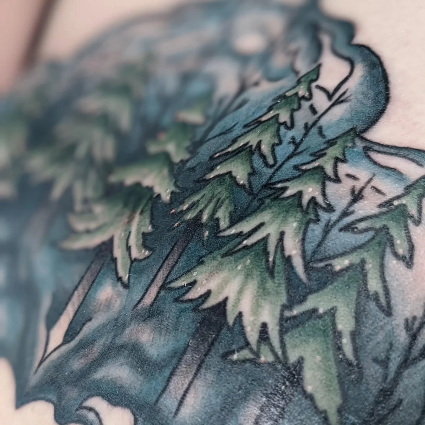 A cool cover-up for a really cool gal. Originally it was going to be a forest fire scene, but she received some bad news after the linework was in that changed the meaning of the tattoo for her, so we had to pivot to change the shading and color sche