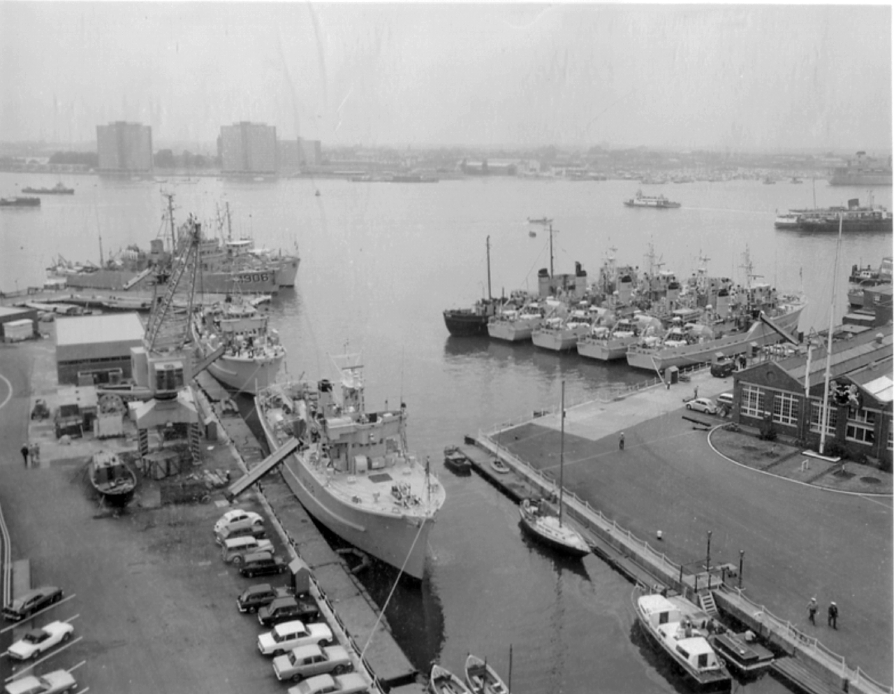 HMS VERNON's diving training tender HMS Laleston with RN, RNR and NATO Mine Countermeasures vessels berthed at HMS VERNON in 1974