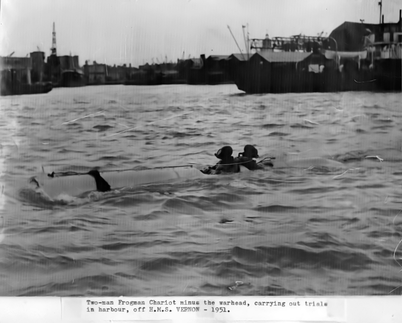 Chariot two-man human torpedo in Portsmouth harbour off HMS VERNON