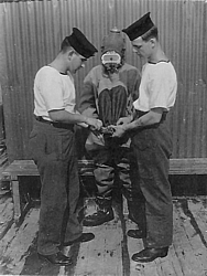'P' Party trainee being dressed in Shallow Water Diving Suit 3 med.jpg