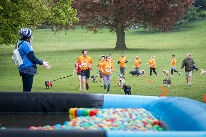 Encouraging the runners at the Muddy Dog Challenge