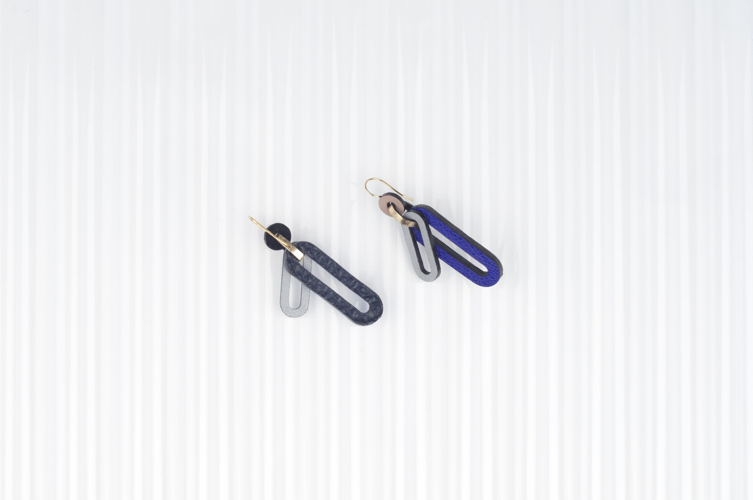 leather earrings with reflective details | Charlie