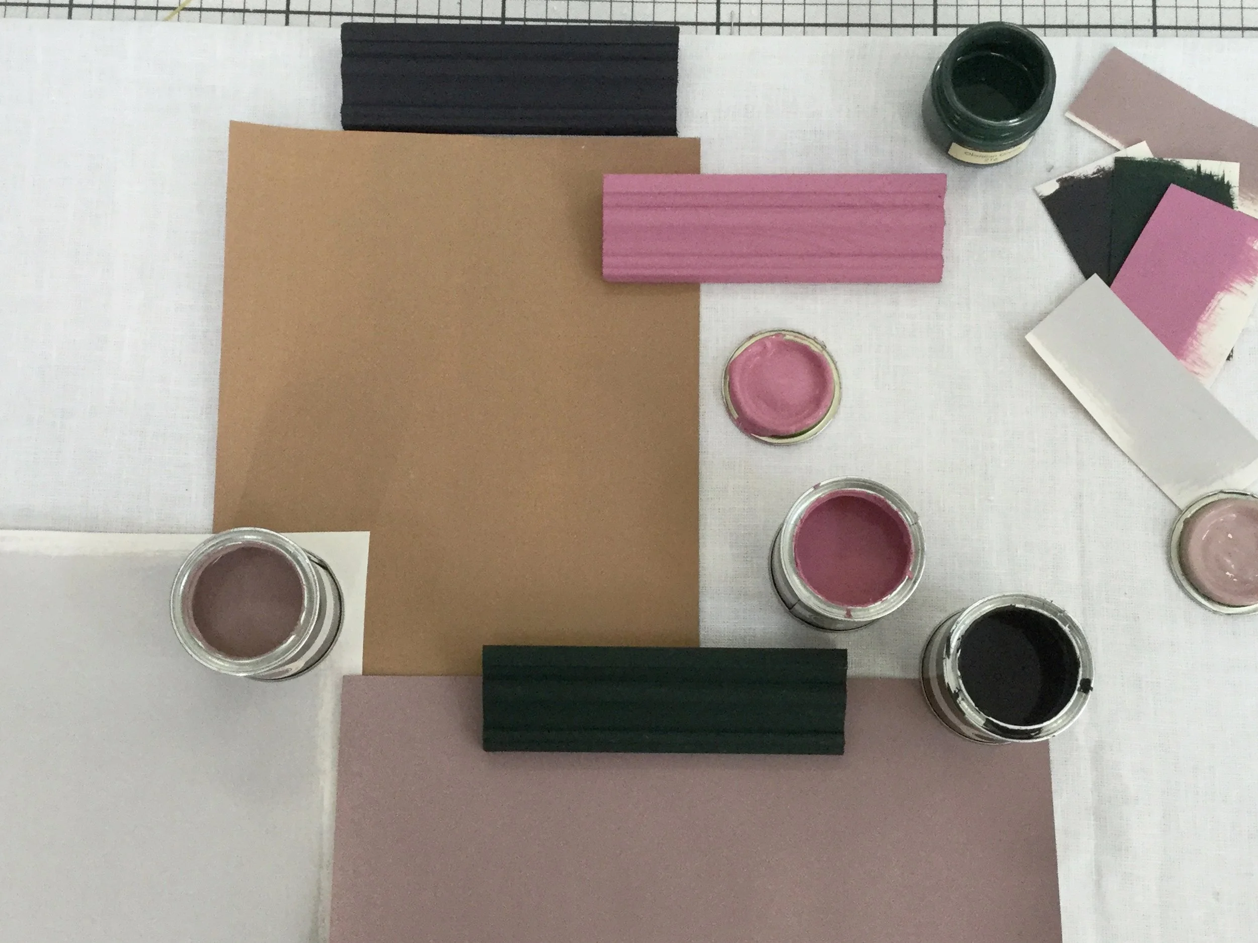Clockwise from Bottom Left - Elephant’s Breath - Farrow & Ball, Spiced Honey - Dulux, Paean Black and Rangwali - Farrow & Ball, Obsidian Green - Little Greene, Sulking Room Pink - Farrow & Ball