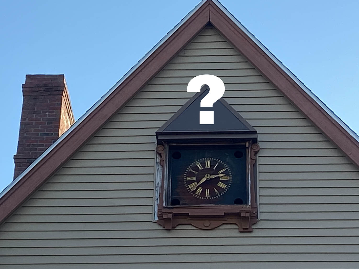 The clock with it’s triangular trim piece just before it was removed for repair this fall