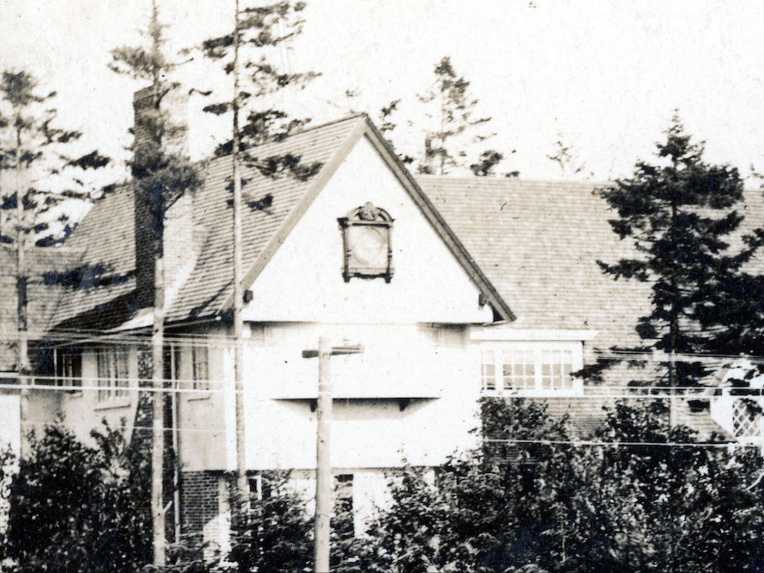 The clock with the original piece of trim along the top which is a bit hard to make out. If you have other photos or memories to share, we’d appreciate the help!