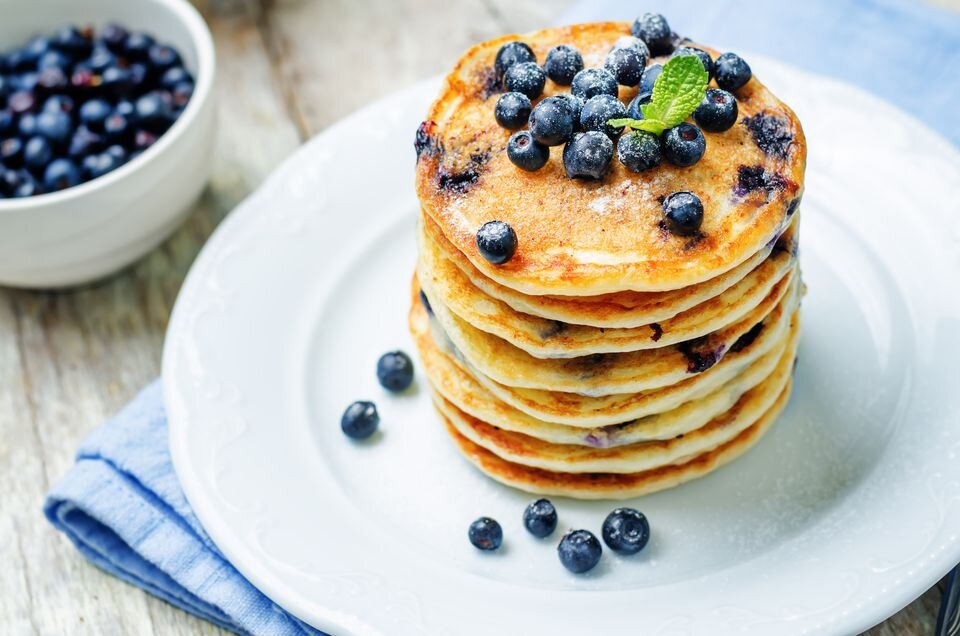 blueberry-ricotta-pancakes-541279742-5ab2d59d04d1cf0036f81d80.jpg