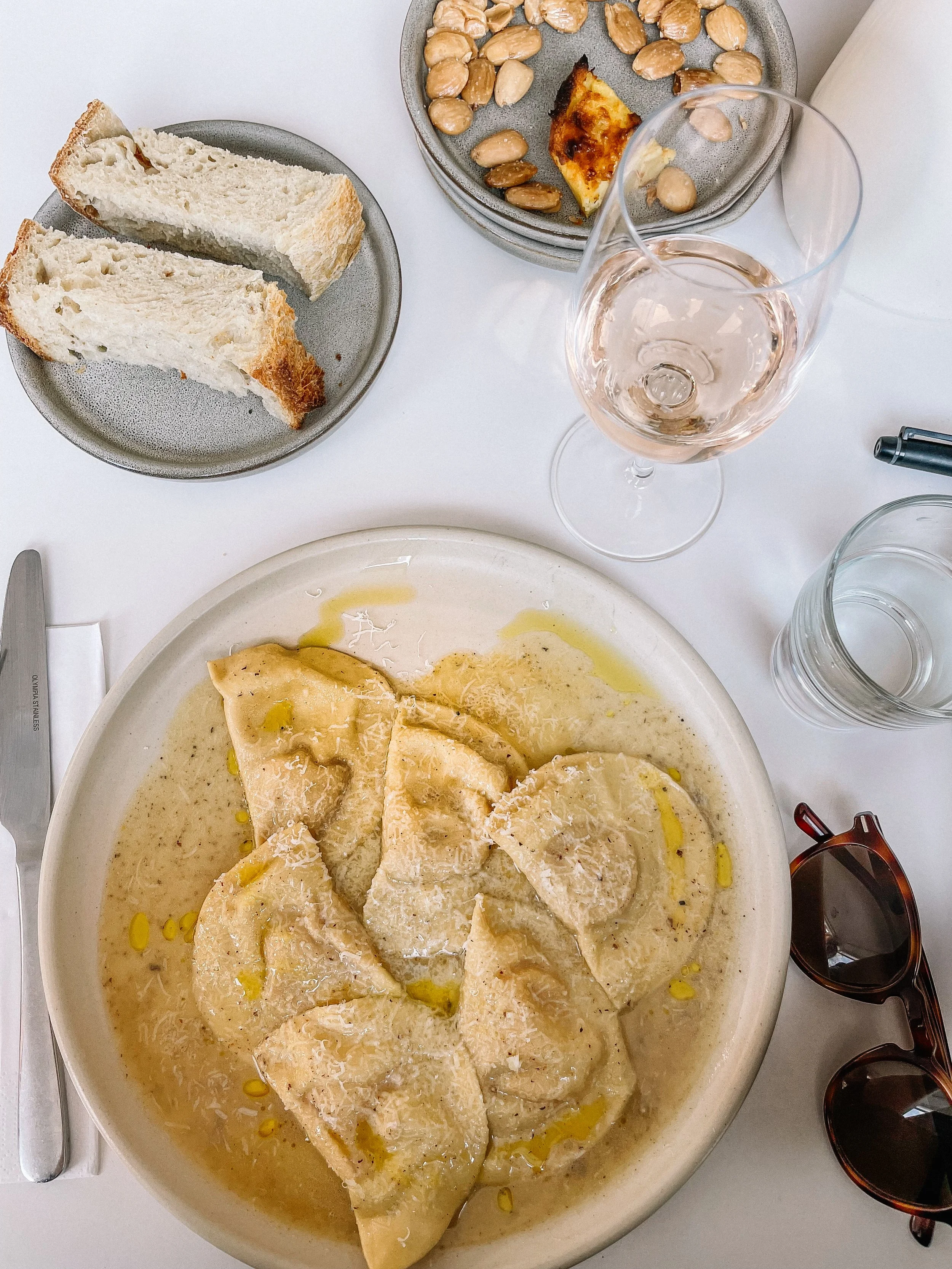 pumpkin pansotti pasta with rose wine and sourdough bread