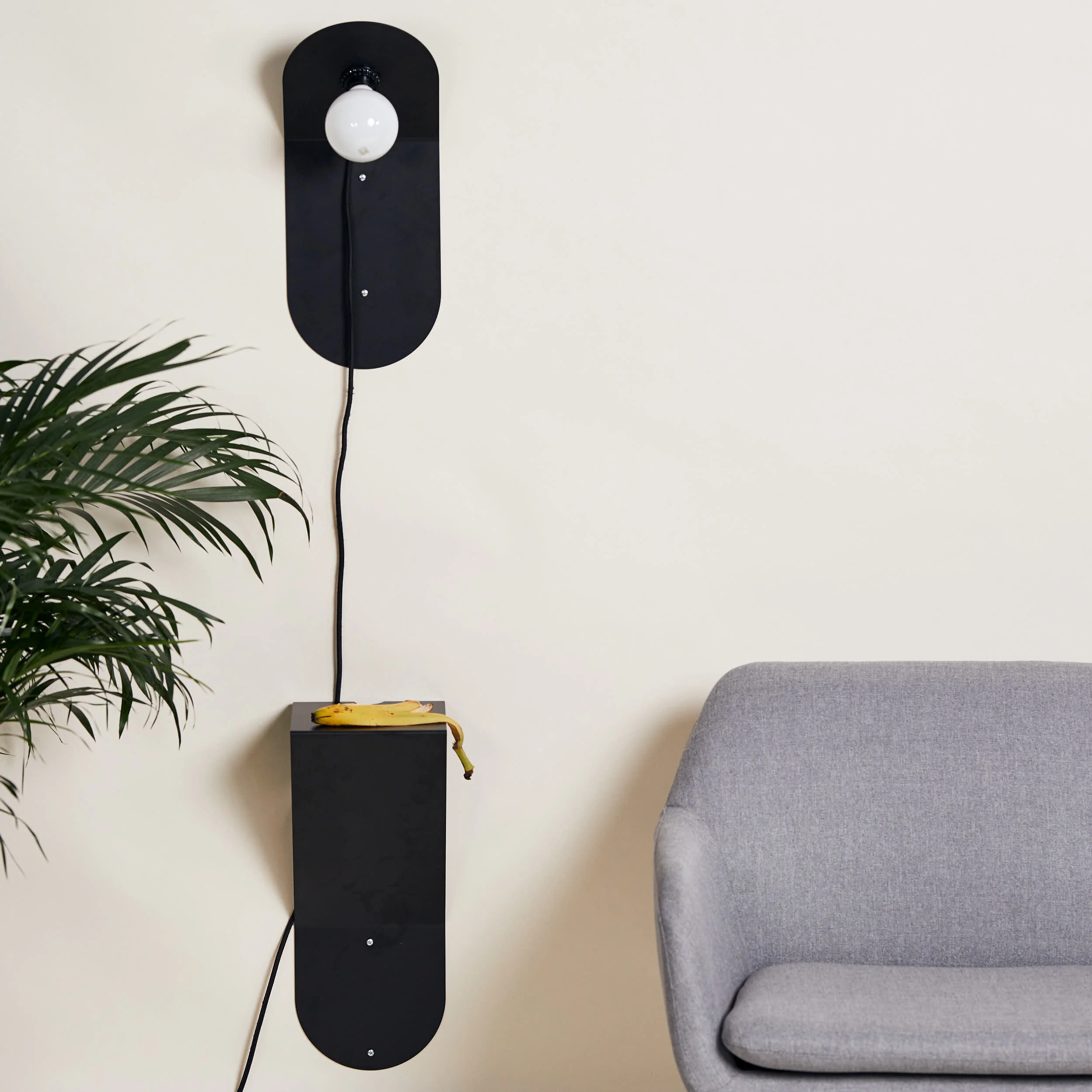 Bent sconce and nightstand
