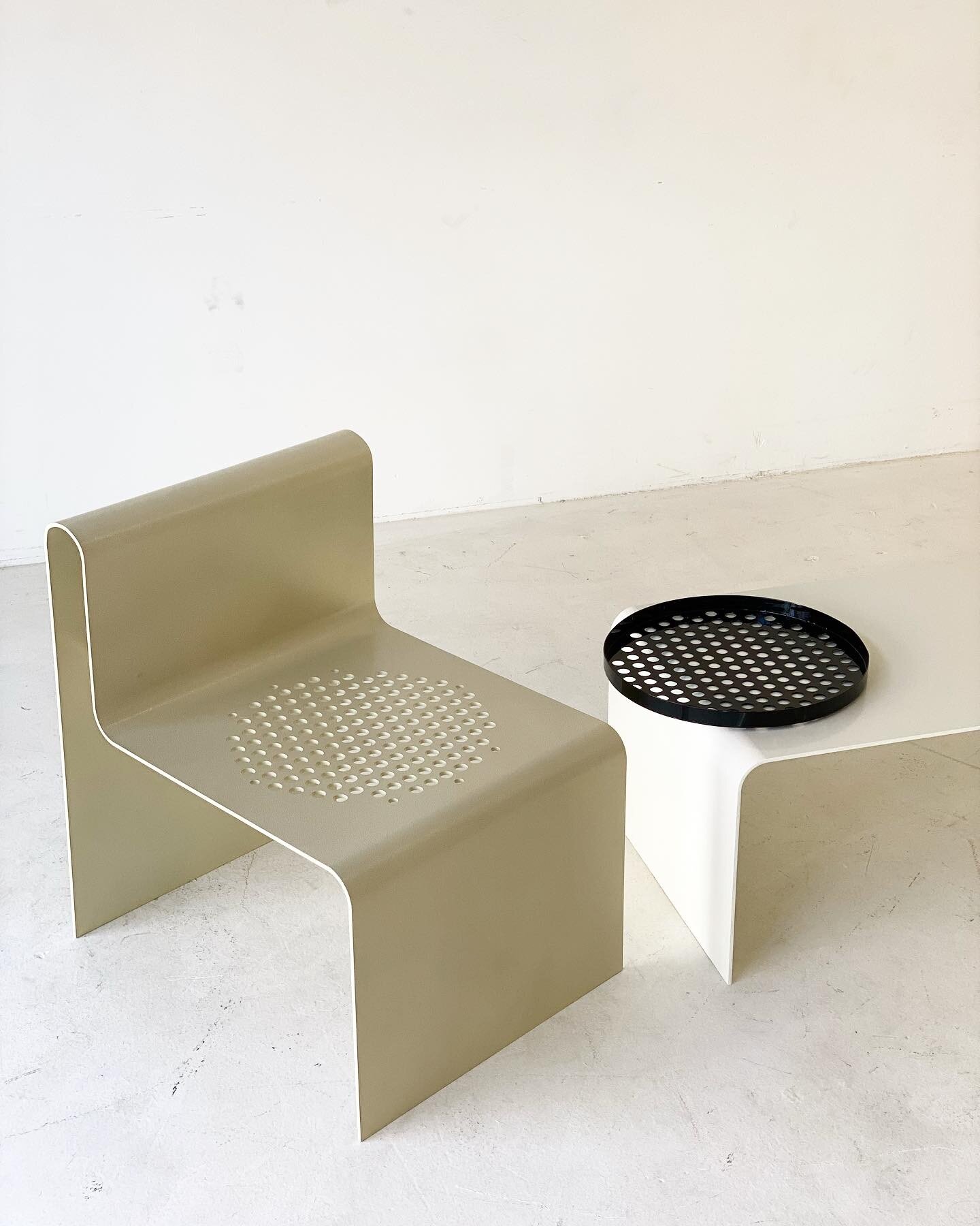 Our MoNO single arm chair with a perforated circular seat and made of lightweight aluminum, can be used indoors or outdoors.

And it pairs oh so nicely with our MoNO bench in white aluminum. With magnets invisibly embedded into the bench&rsquo;s alum