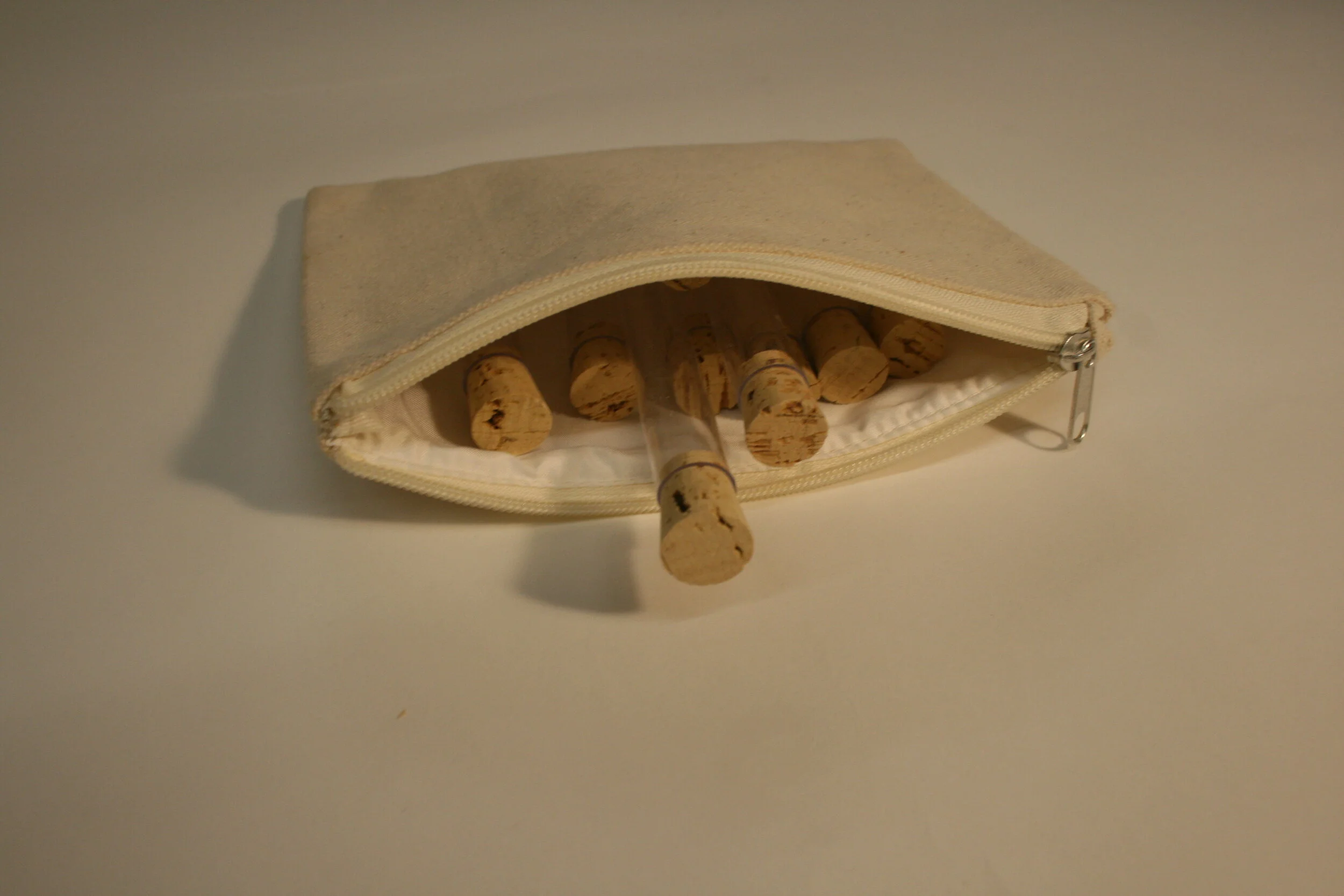 Bag of test tubes for seed storage and planting.