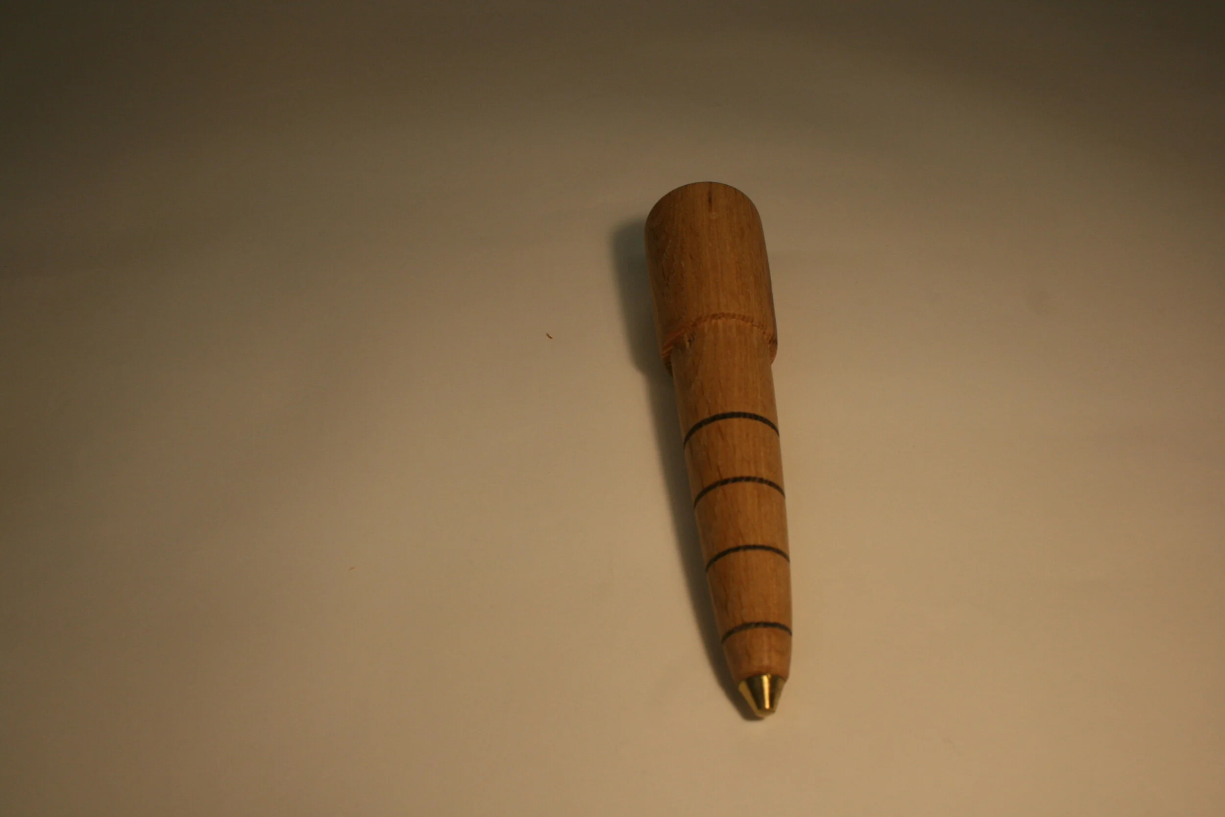 Dibbler with graduated depth rings by inch.