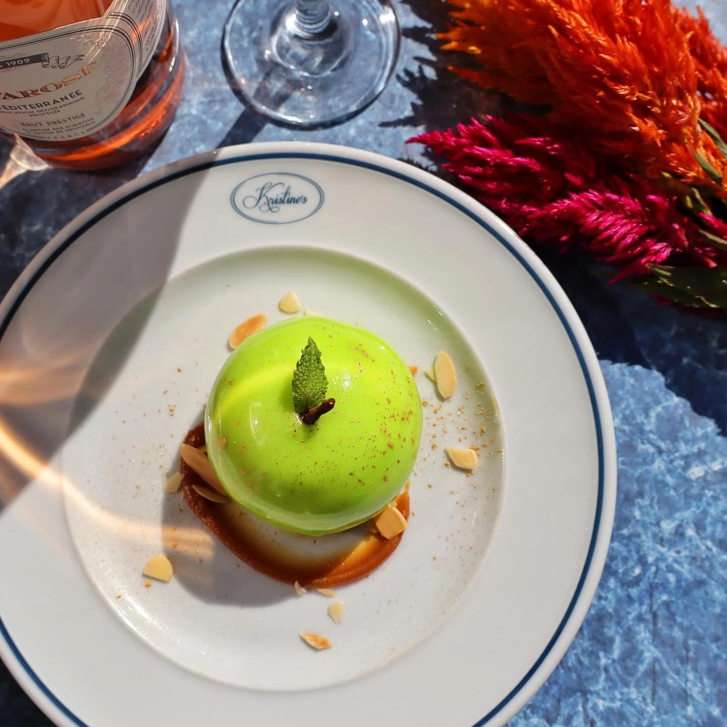 🍏 Green Temptation 🍏

Almond cake, Apple Bavarois with a caramel apple center topped with a green mirror glaze. 😍
