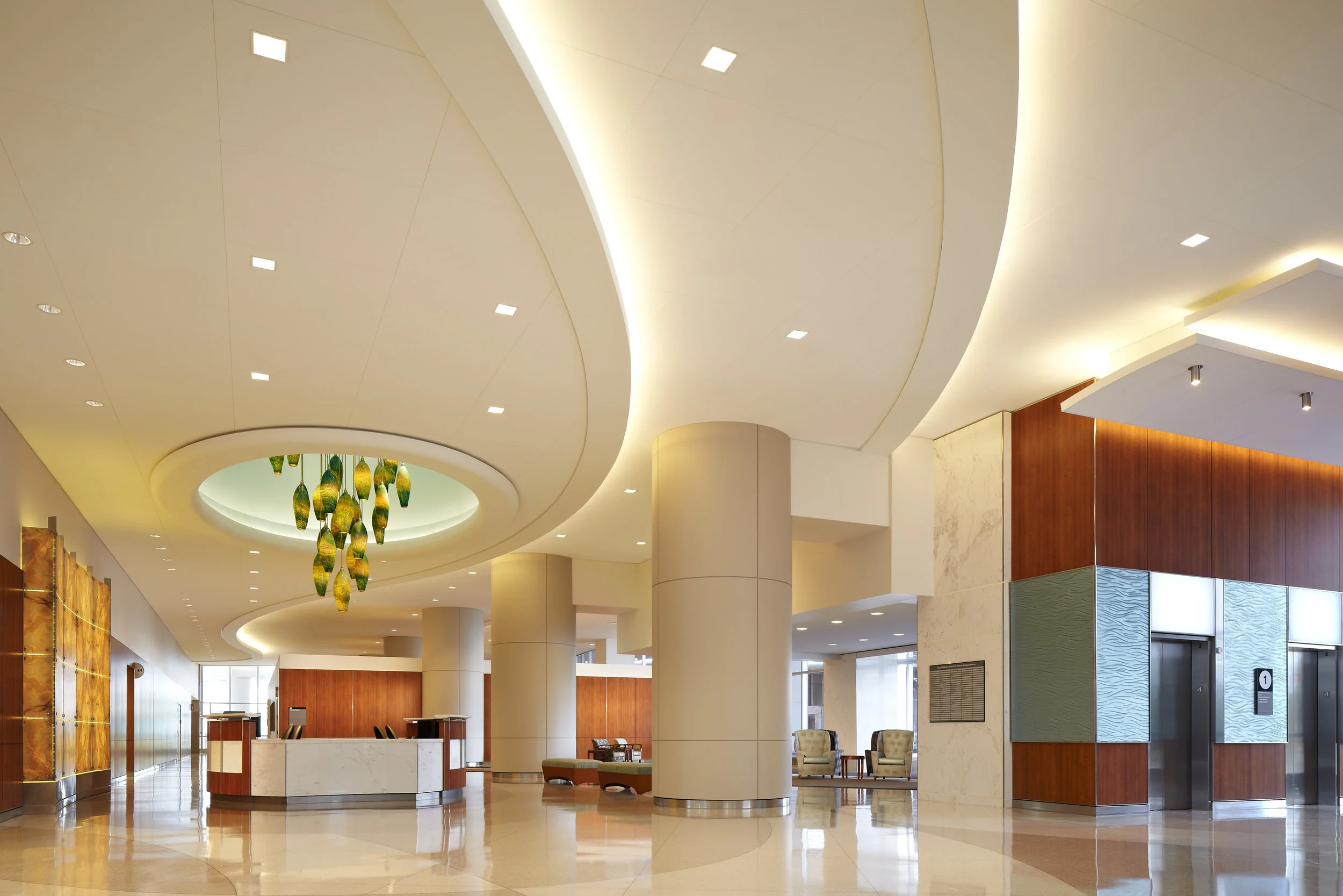 The "Jewel" art glass lighting piece guides visitors to the front desk at Texas Children's Hospital