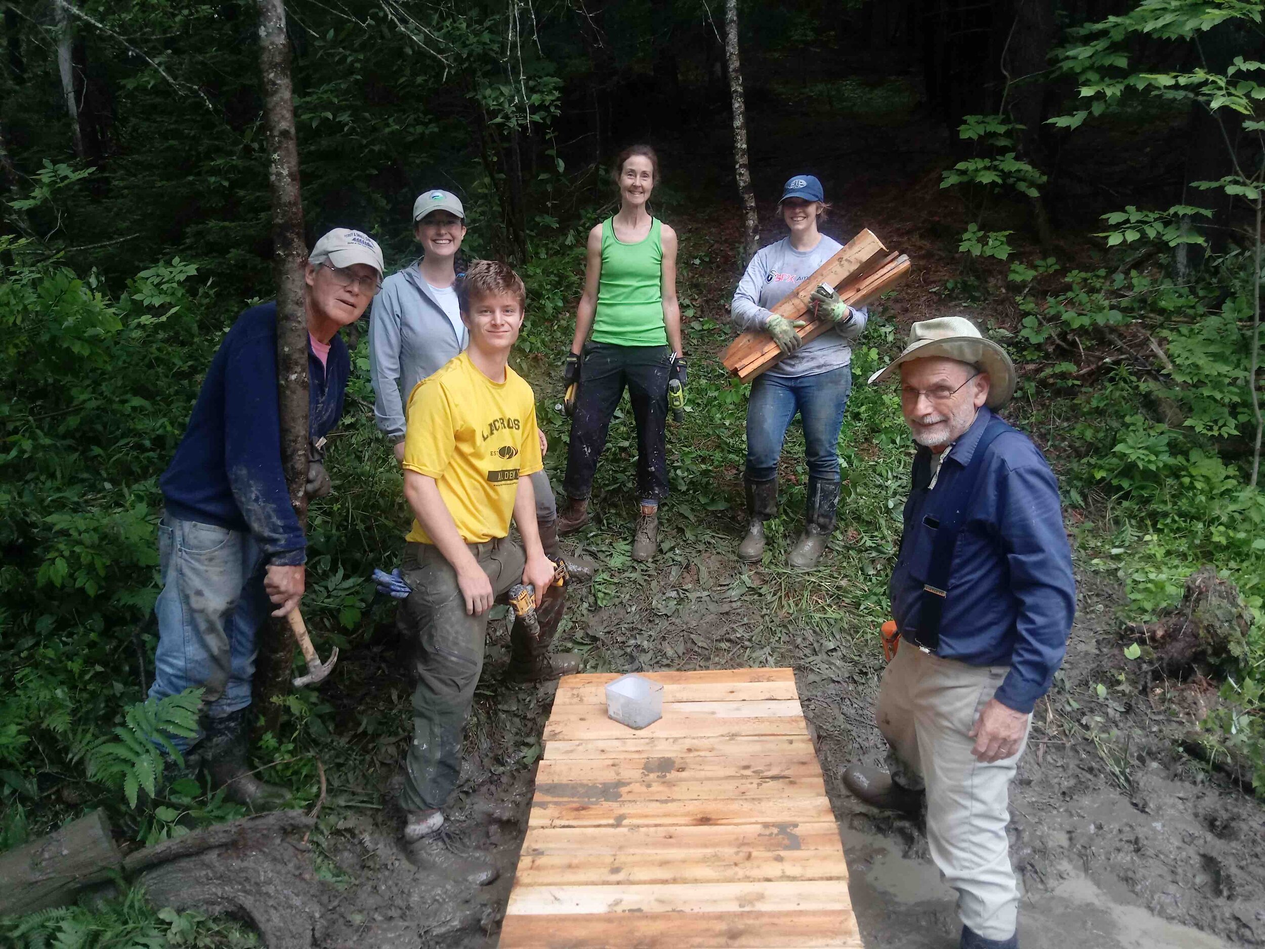  Building bog bridges at Red Rose Preserve. 