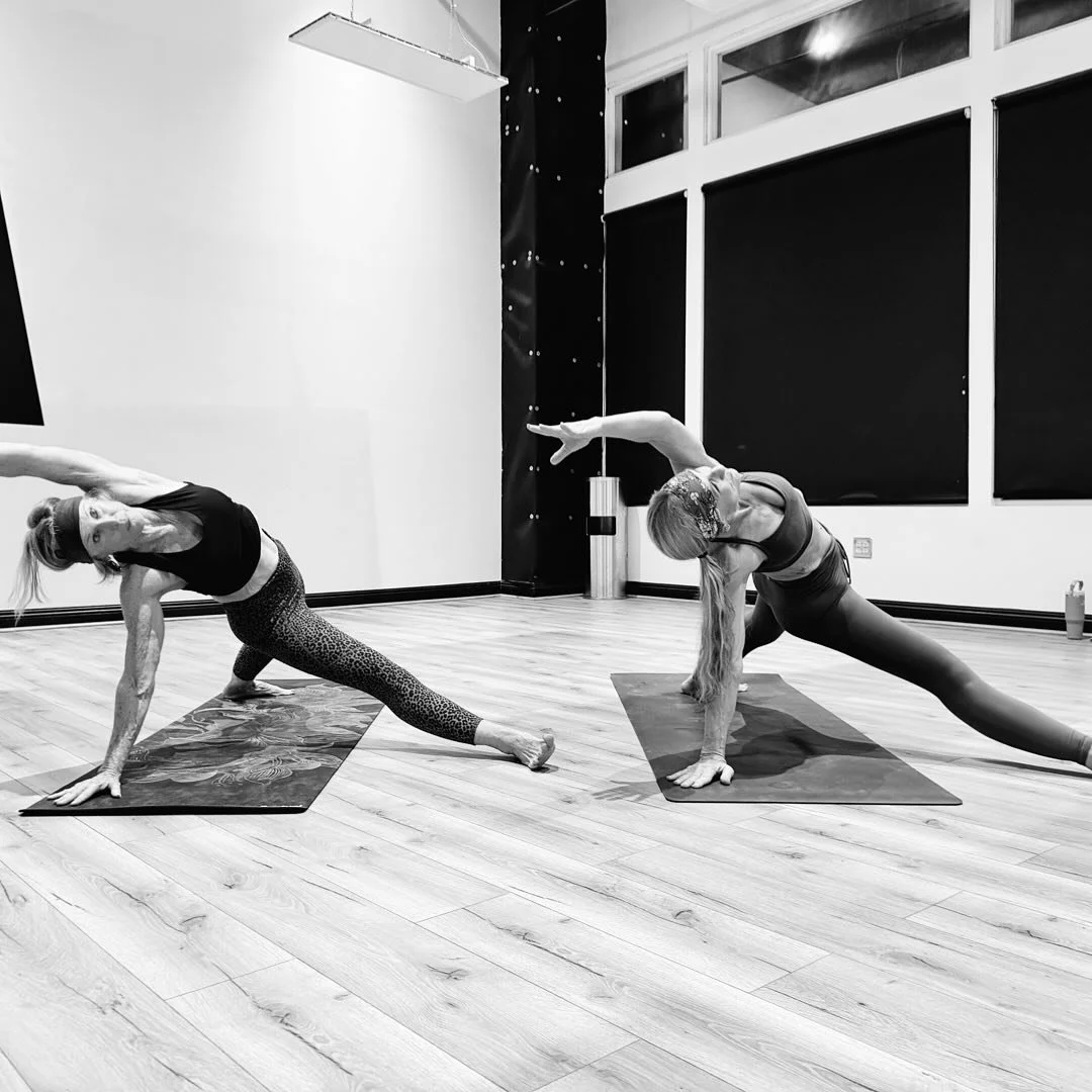Two hearts, one flow ✨ Our students finding their edge in matching Fallen Triangle poses &mdash; a perfect balance of strength, extension, and grace. 💫 #MPowerYoga #FindYourBalance #FallenTriangle #YogaInspiration #MPowerCommunity