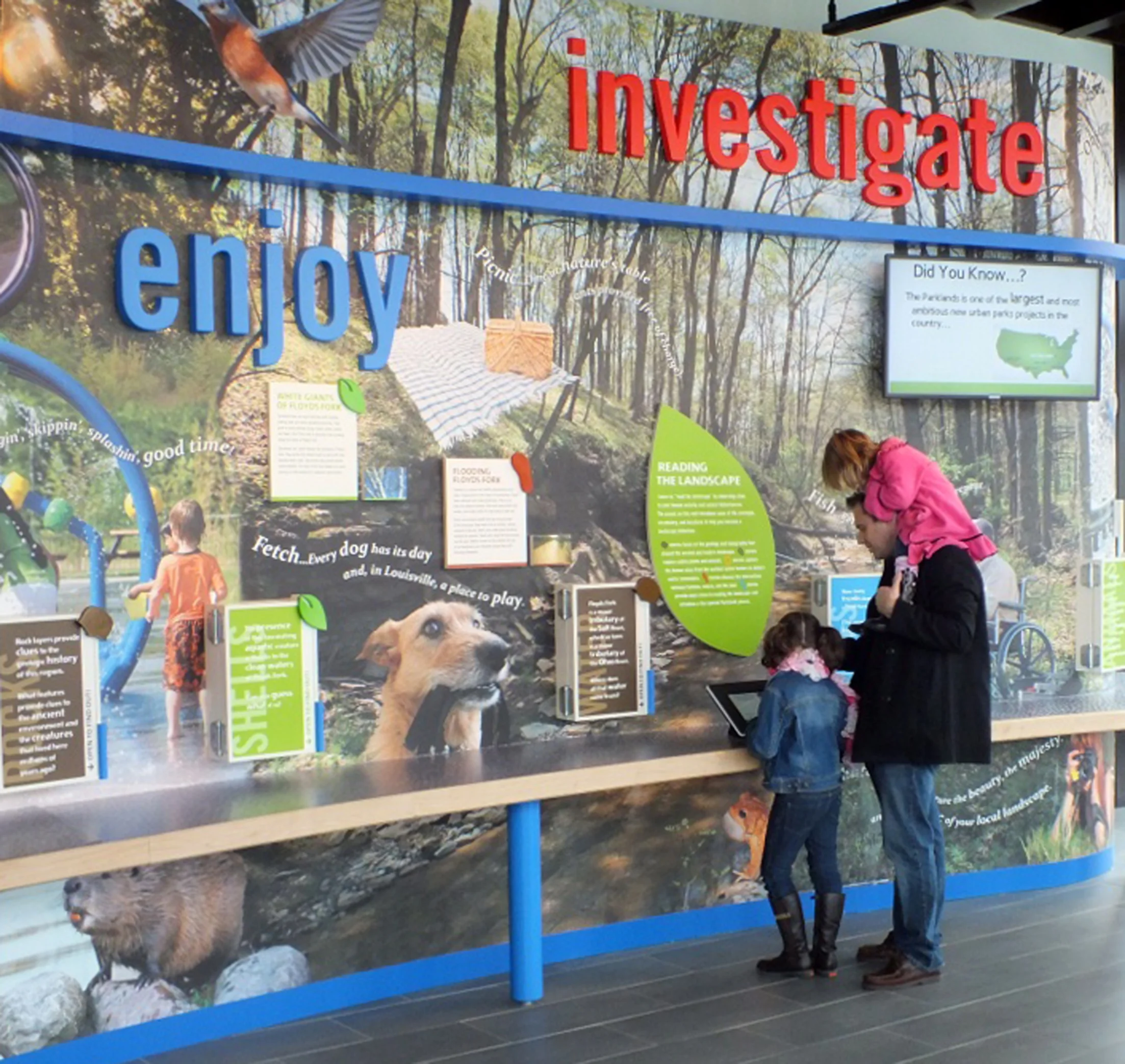 The new visitor center features colorful and fun graphics. Information on the natural history, wildlife, landscapes, and activities of the park system are shared through panels, monitors, and tablets. 