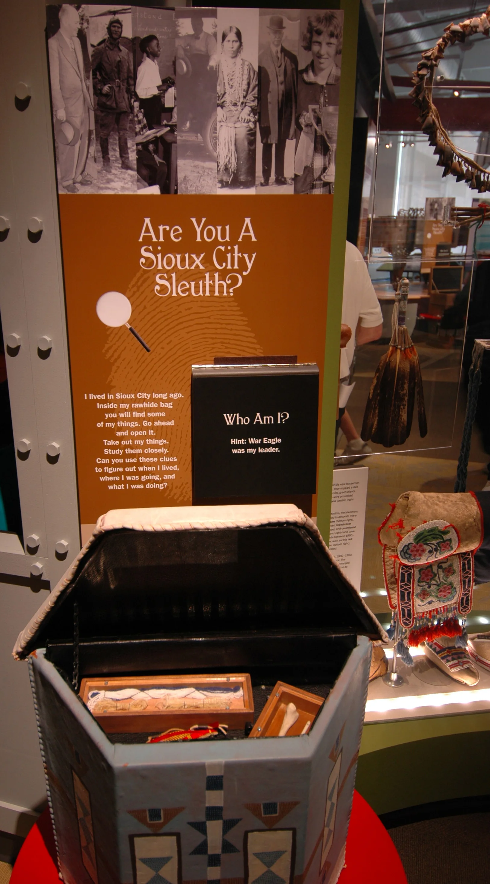 The Sioux City Public Museum features several themed boxes integrated into exhibit areas, encouraging visitors to explore and touch reproductions of artifacts relating to each area. 