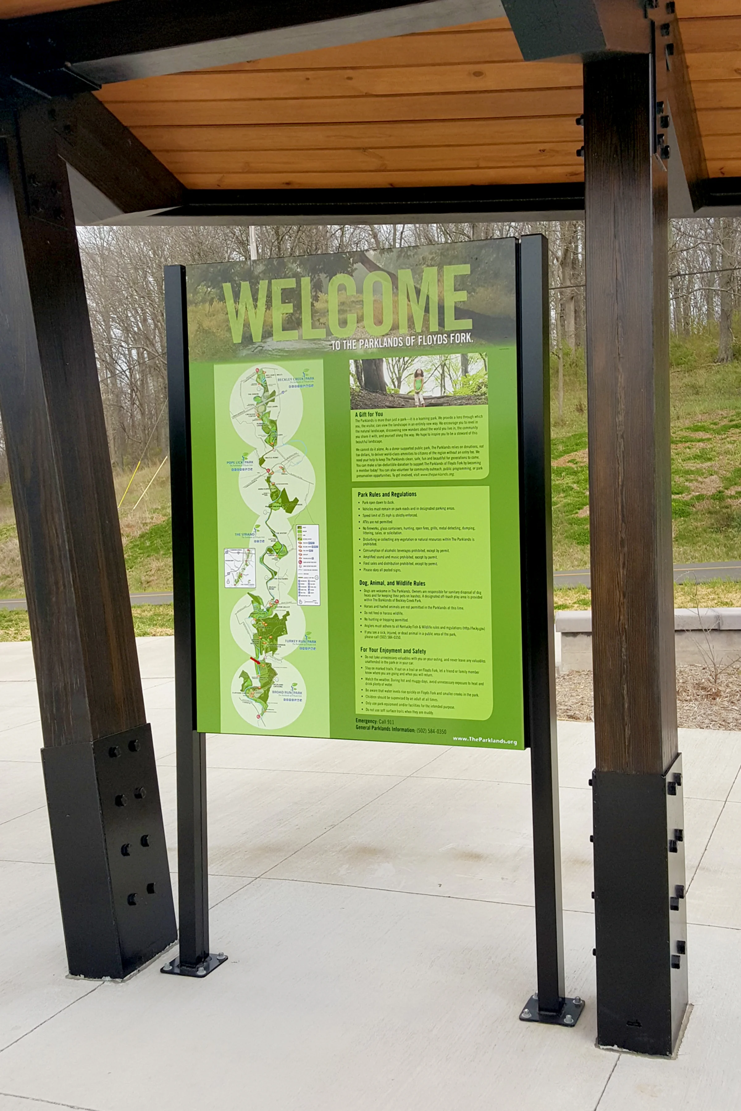 Exterior signage uses colorful design and durable materials to share park information.
