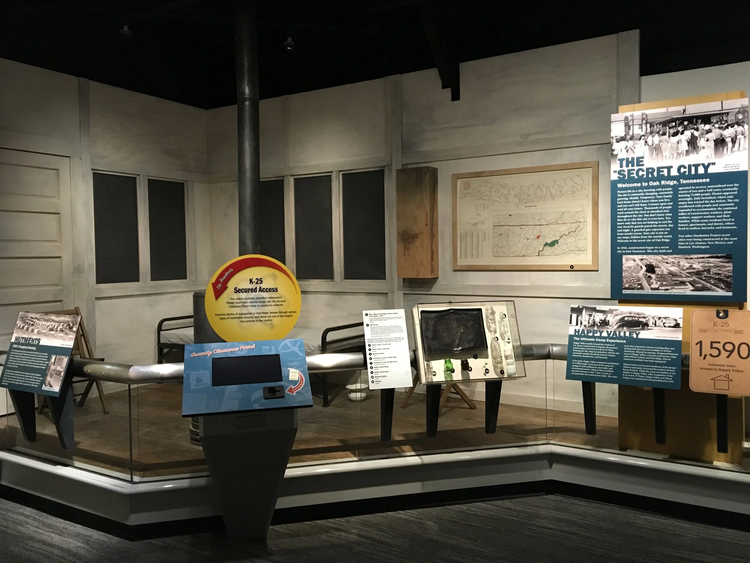  A corner of the first gallery recreates a “hutment” housing unit. 