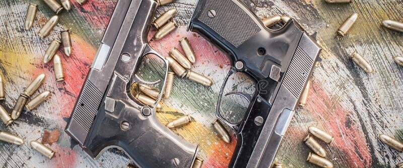 top-view-gun-ammunition-table-top-view-gun-ammunition-table-bullets-pistol-shooting-range-139805594.jpg