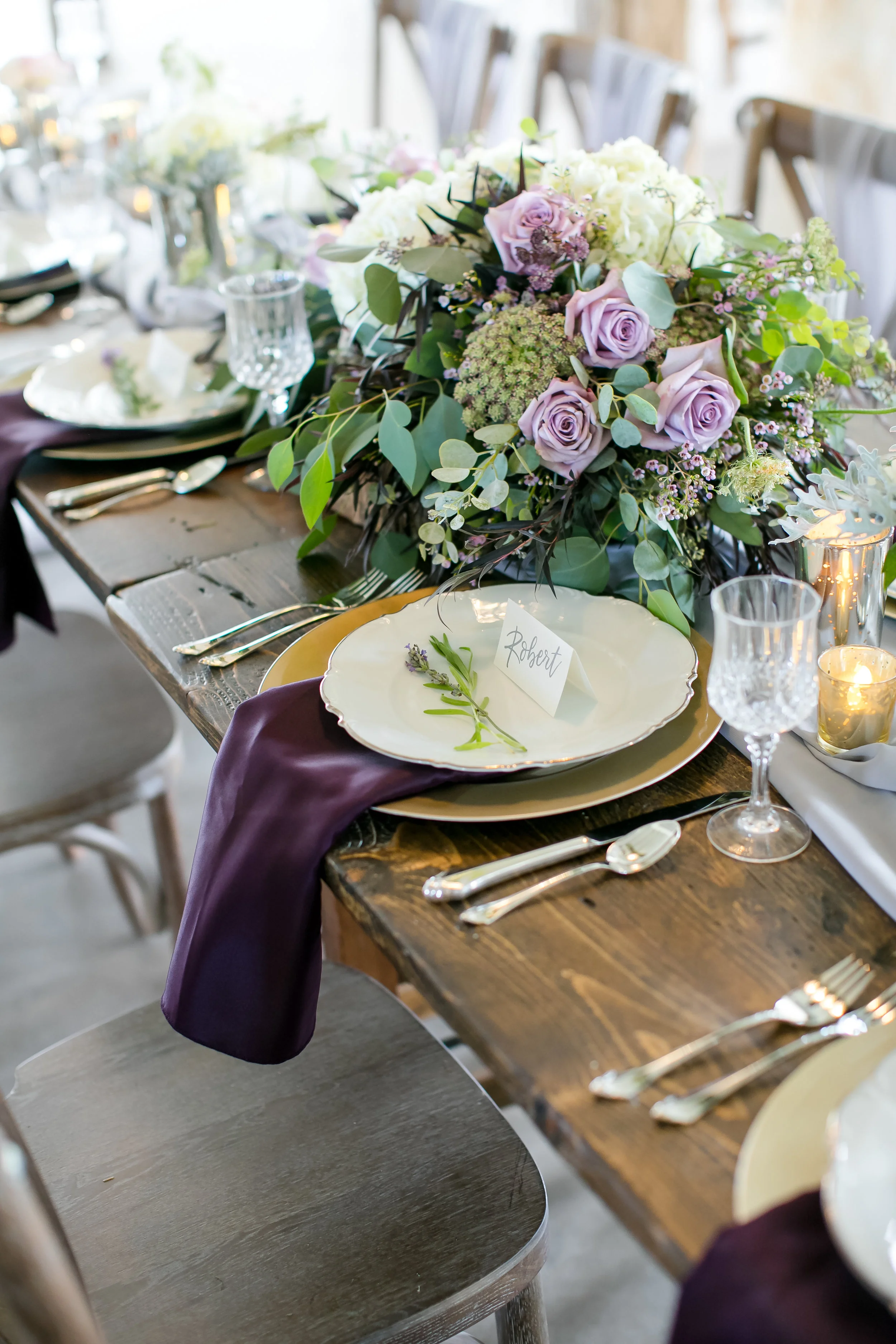 champagne charger with plate and eggplant napkin