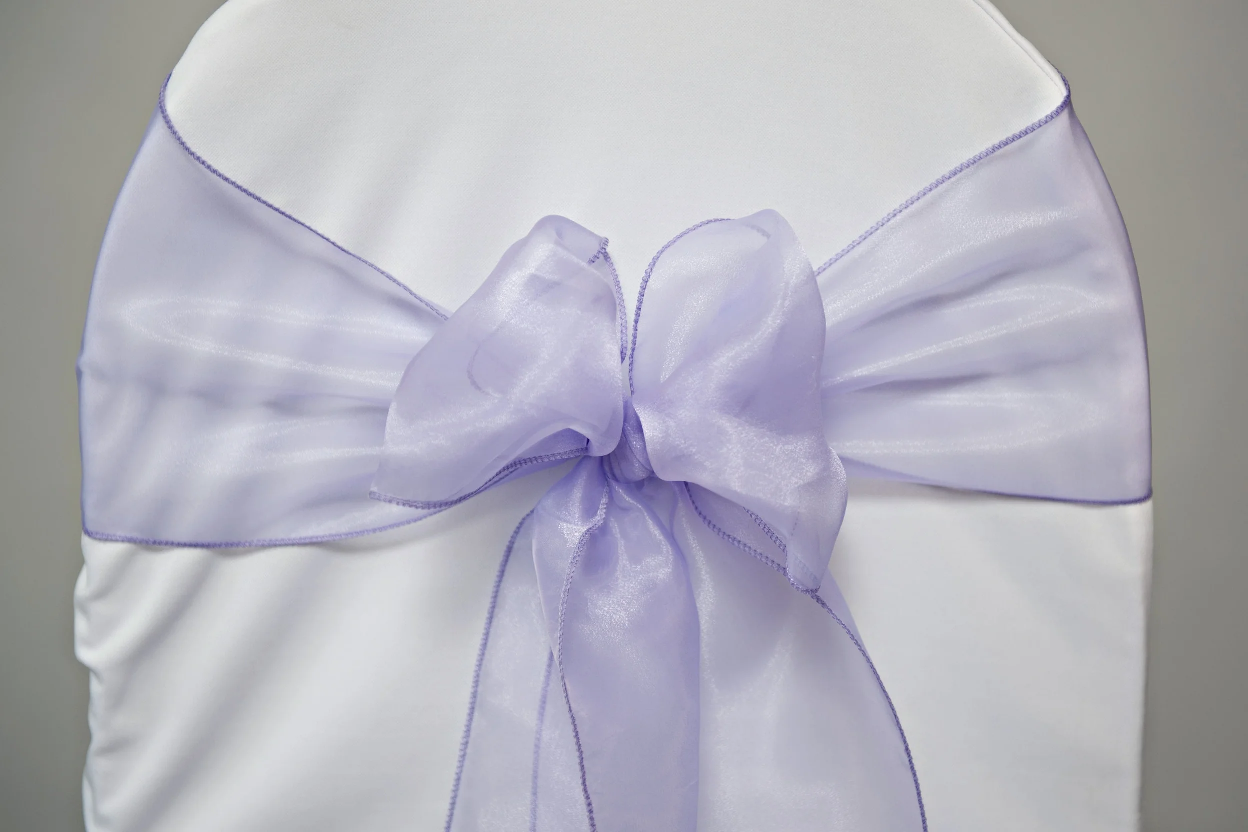 lilac organza chair sash tied in a bow