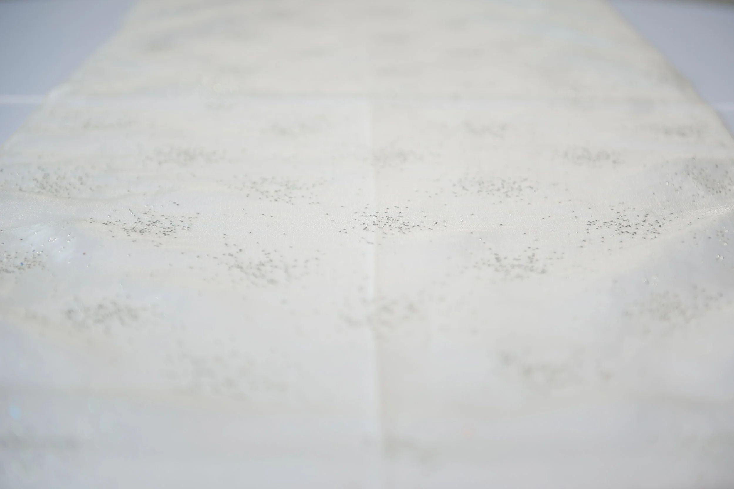 ivory diamond organza table runner on table