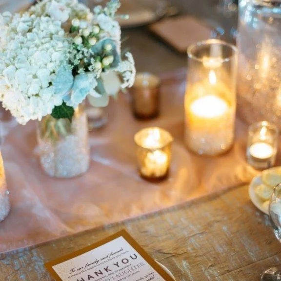blush organza table runner with candle decor