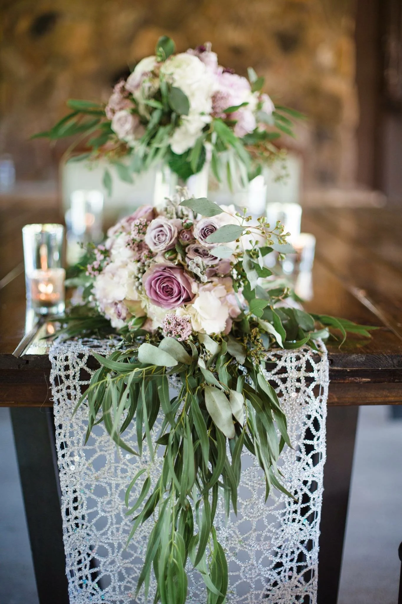 silver sequin link table runner draped off table
