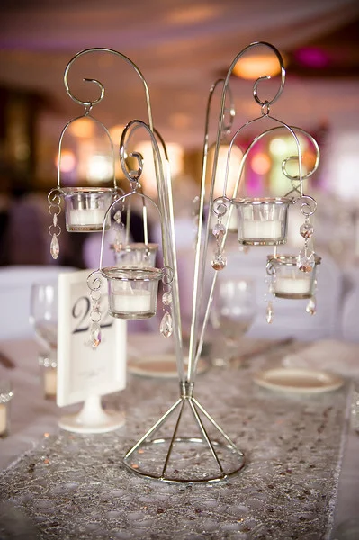 silver chain link table runner with crystal votive centerpiece