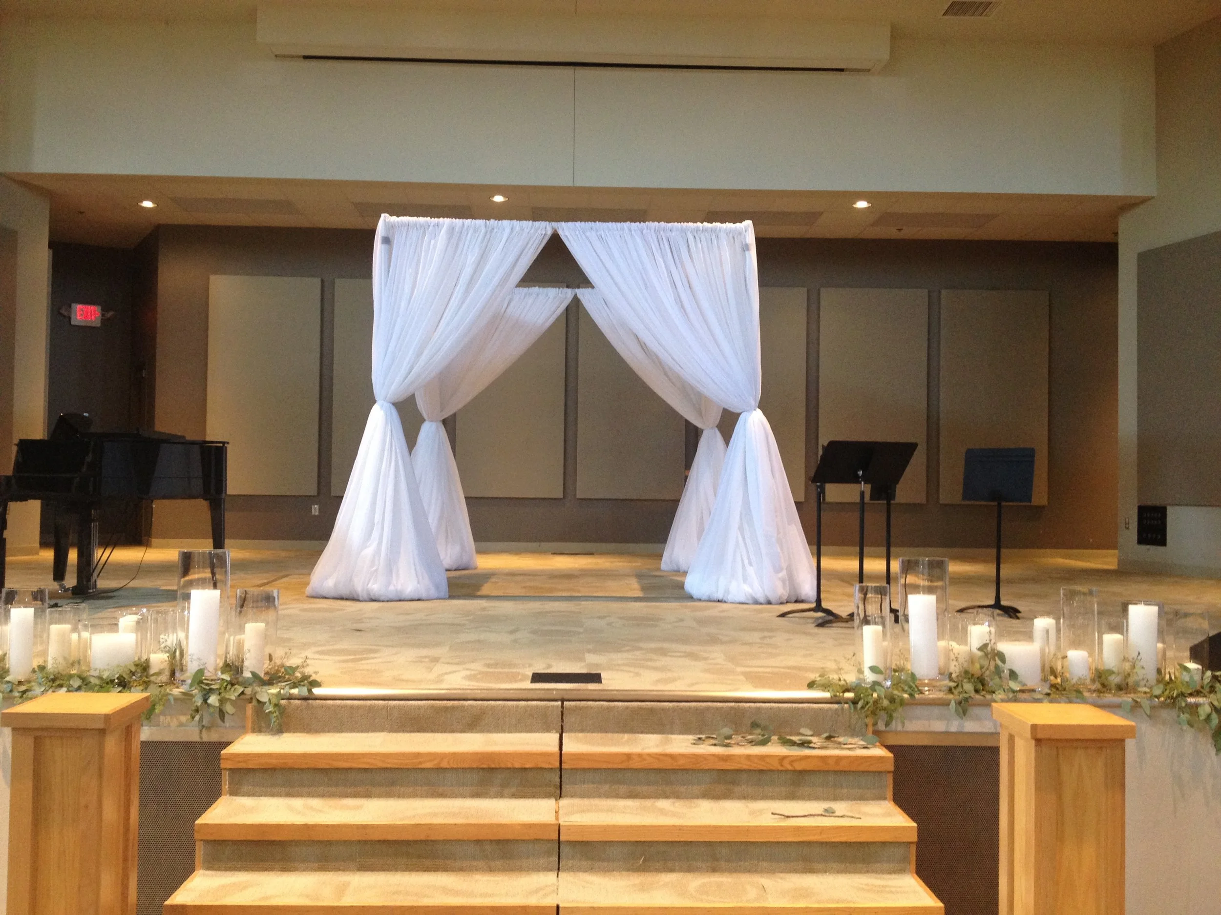 indoor draping canopy with white curtains