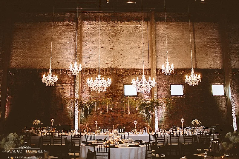 Six crystal chandeliers hung above the head table for elegance and great style.