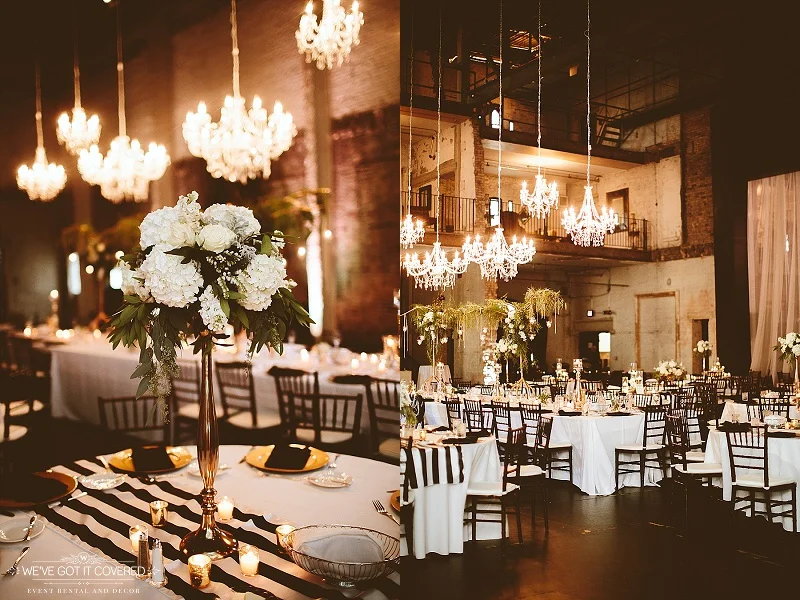 Tall flower candlesticks are displayed with gold candle mercury glass votives on top of a classy table runner.