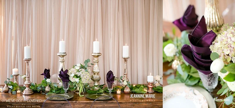 Farm table that has candlesticks and floral mixed in for an extra rustic appeal.