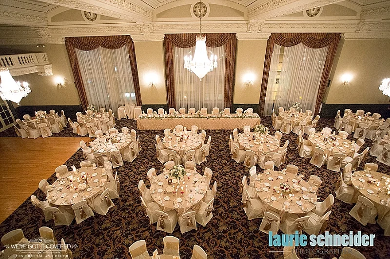 Wedding reception with decoration ideas that include gold and ivory
