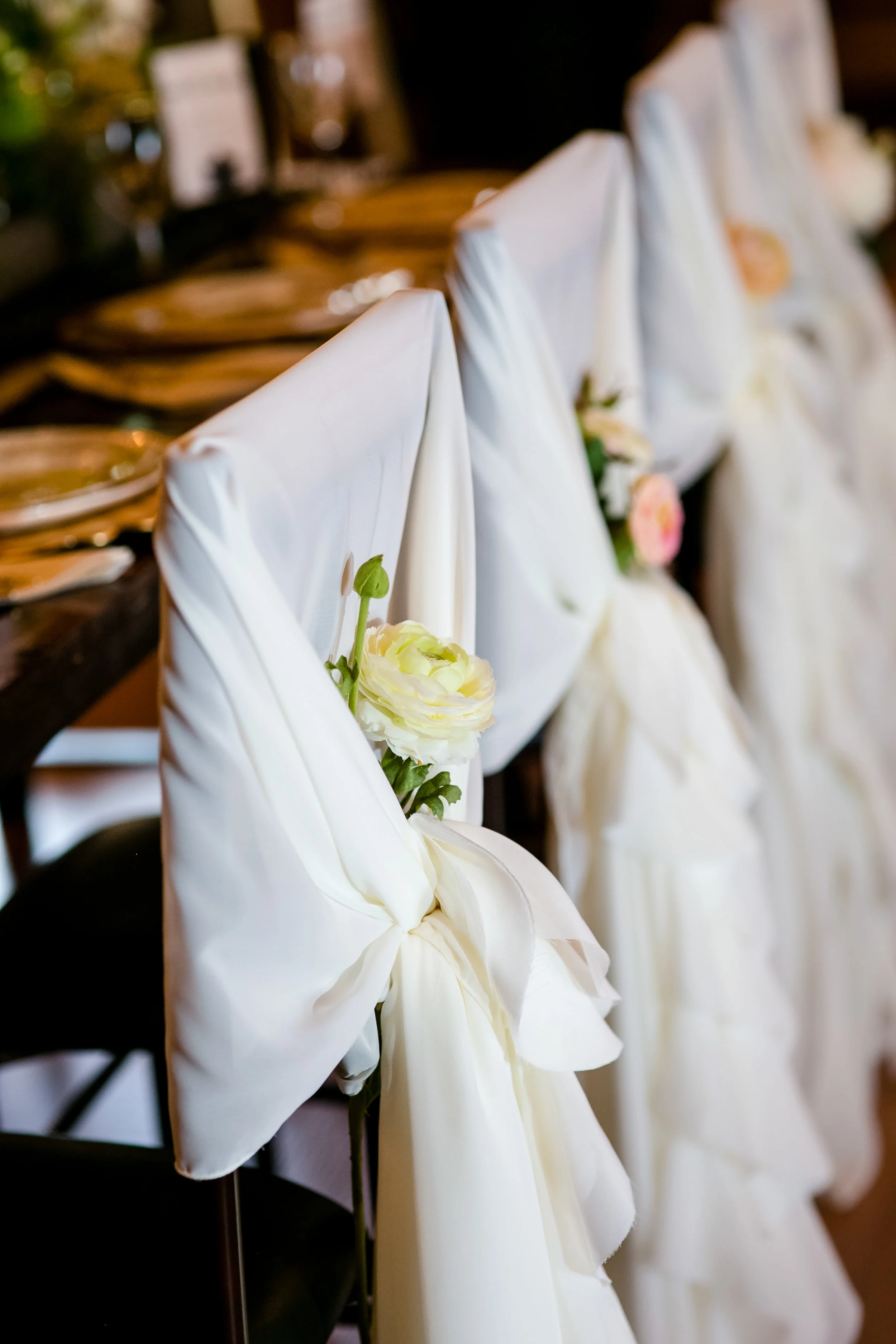 chair back ruffle with flower around head table