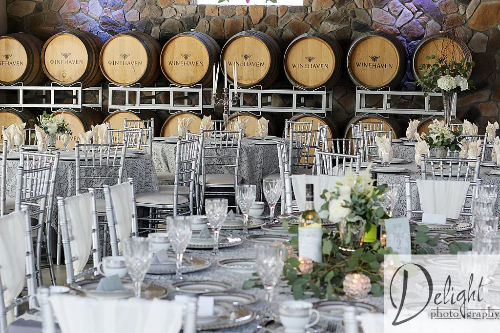 Reception decor featuring chargers, linens, chivari chairs and more
